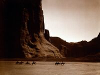  .   ʸ (Edward Sheriff Curtis). Canyon de Chelly  Navajo. Seven riders on horseback and dog trek against background of canyon cliffs. 1904 